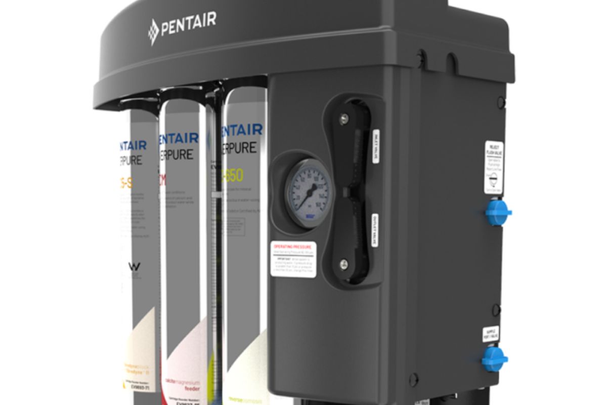Pentair reverse osmosis system with multiple filter cartridges, pressure gauge, and control housing for industrial water treatment